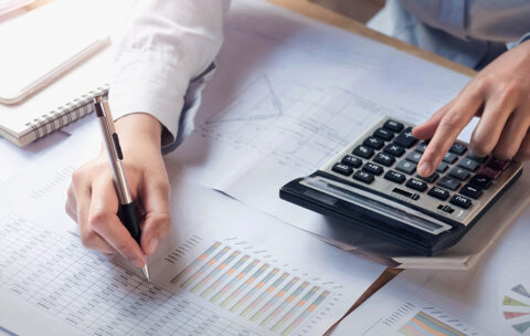 finance and accounting concept. business woman working on desk u